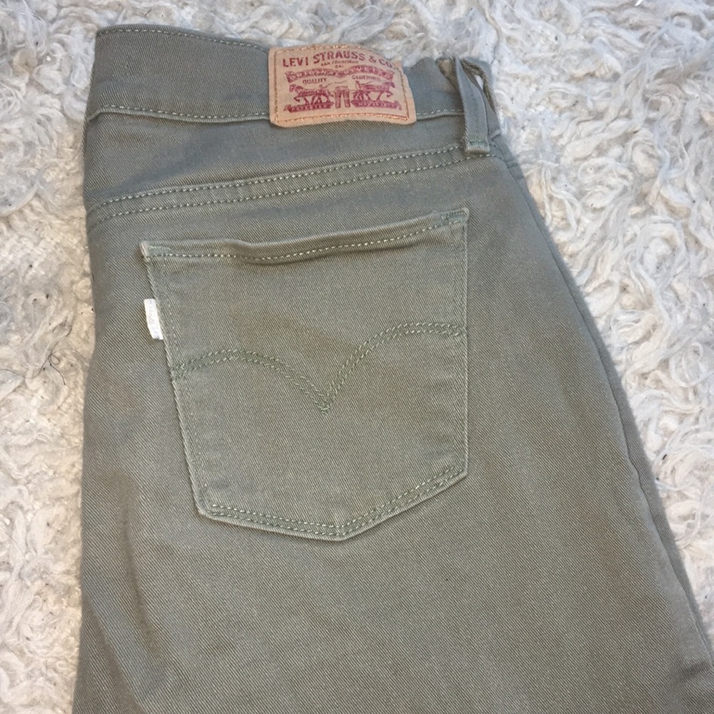 Army green Levi skinny jeans